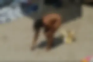 Girls on a nude beach in Sitges, Spain