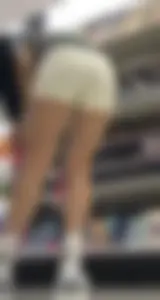 Amazing Asian in white yoga shorts upshot bends squat at Target