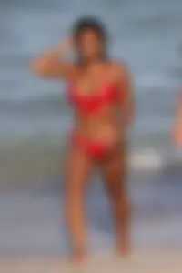 Christina Milian in red bikini in Miami with hard nipples