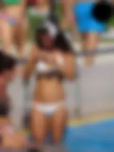 Sexy bikini babe in a white bikini at the pool with camel toe