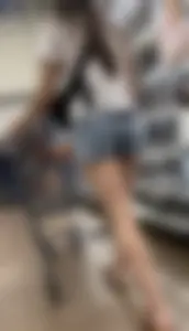 Babe with a  tight ass & long legs in Levi shorts