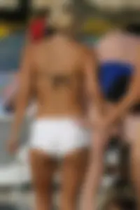 Beach voyeur girls in bikinis, thongs and topless
