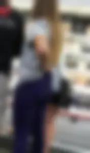 Blonde ass grocery shopping in blue and black leggings