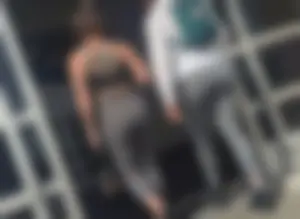 Tight ass in spandex with back Tattoo
