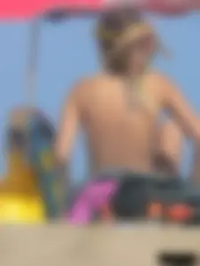 Sexy girls going topless at the beach showing off their sexy bodies