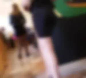 Girl in Shorts and Pantyhose Cafe Legs Closeup