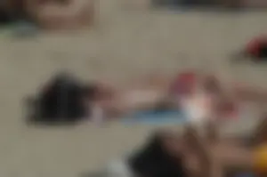 Topless girls on a beach in Barcelona
