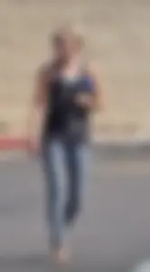 Skinny blonde in grey leggings with a friend