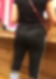 Mature sexy lady in Pink leggings shopping at Pink