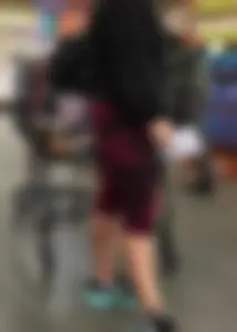 Milf grocery shopping in red leggings with a great ass