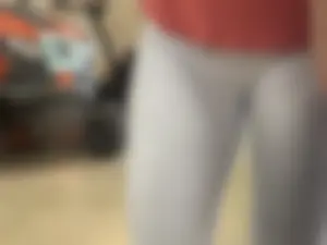 Closeup of a ladies crotch and booty in white leggings