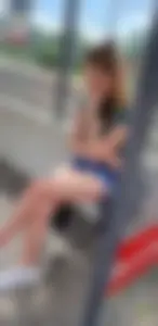 A Cute Candid Girl With Long Gorgeous Legs in Jean Shorts Sitting at the Bus Stop Creepshots