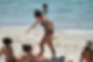 Sexy ass girl with a perfect body in her bikini on the beach
