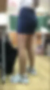 Very nice school teacher's booty in a skirt and legs in pantyhose in classroom