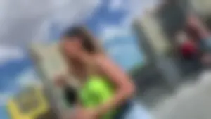 Sexy Latina showing her ass cheeks in little denim shorts and pokies with no bra