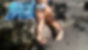 Sexy bikini ass laying out on the rocks up close