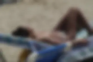 Girls on a nude beach in Sitges, Spain