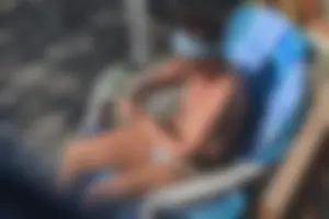 Creepshots of a neighbor milf in a bikini while sunbathing