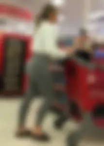 Sexy lady shopping at Target with a big ass in grey leggings