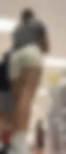 Amazing Asian in white yoga shorts upshot bends squat at Target