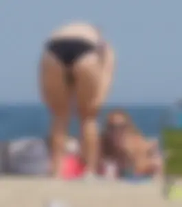 3 girls on the beach in bikinis with big boobs, one brunette and two blondes
