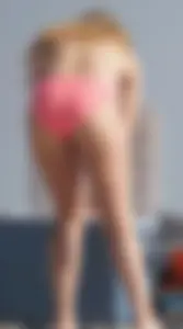 Thick blonde bikini babe on the beach