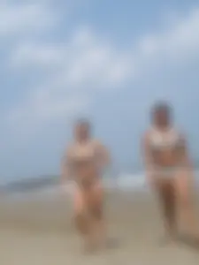 Stalking the busty girl on the beach
