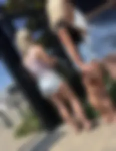 Blonde in cut offs with friends