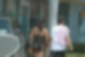 Sexy Florida girl showing her white thong bikini under see through dress