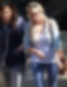 Hot blonde girl in tight blue leggings with nice ass