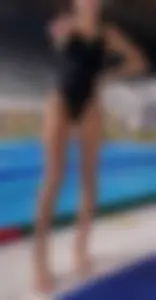 Swimming pool candid teen in a one-piece swimsuit