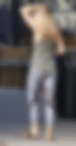 Hot blonde in light leggings after getting Starbucks