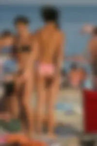 Beach voyeur girls in bikinis, thongs and topless