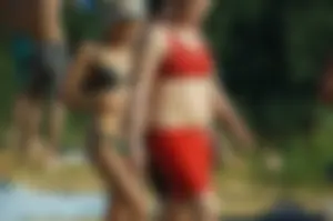 Group of Girls in Swimsuits Walking on the Beach Candid Photo Gallery