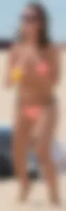 Girl in peach bikini on the beach with a great body and great ass