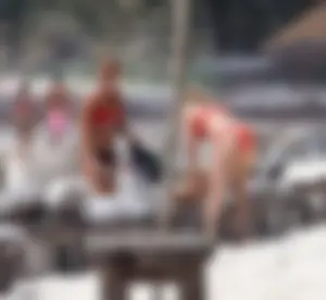 Ashley Tisdale in red bikini at a beach in Mexico