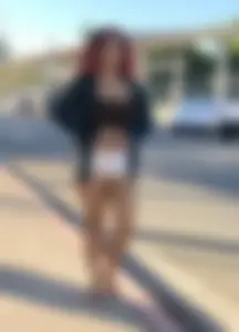 Big boobed redhead walking with no shoes and in shorts