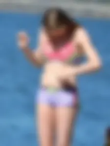 Beauty at the beach in booty short bikini