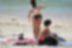 Sexy ass girl with a perfect body in her bikini on the beach
