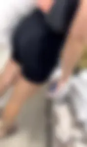 Cute brunette in black shorts
