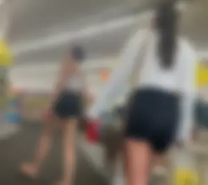 College girls at CVS with black yoga shirts and white tops