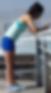 Athletic babe in blue spandex shorts with a nice ass
