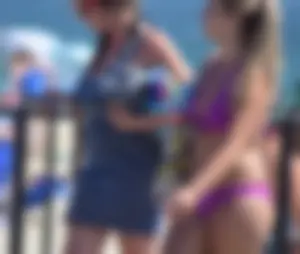 Sexy thick blonde girl in purple bikini