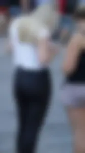 Thick blonde with big booty in Nike leggings showing vtl