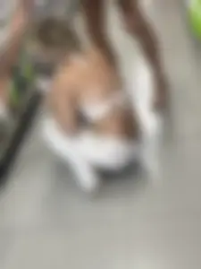 Blonde college girl squatting deep in supermarket, visible thong!