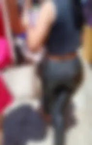 Mexican MILF in leather pants with big round ass showing thong - Oc