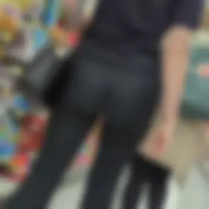 Brunette babe in black flares