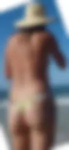 Cute girl on the beach with a decent body in thong bikini
