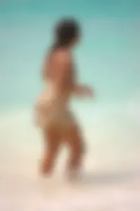 Assortment of sexy babes at the beach in bikinis