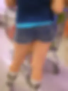 Pretty girl grocery shopping in short shorts